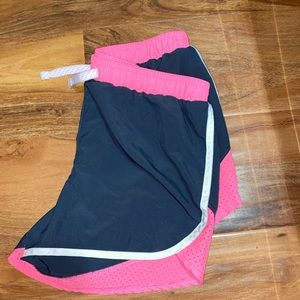 Gray/pink/white Under Armour shorts